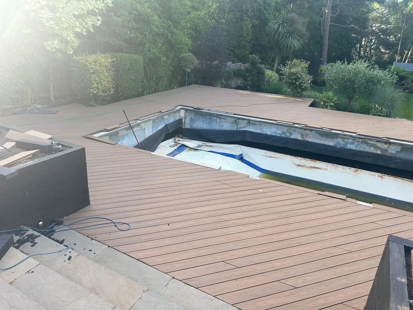 Extensive composite decking around a pool surround