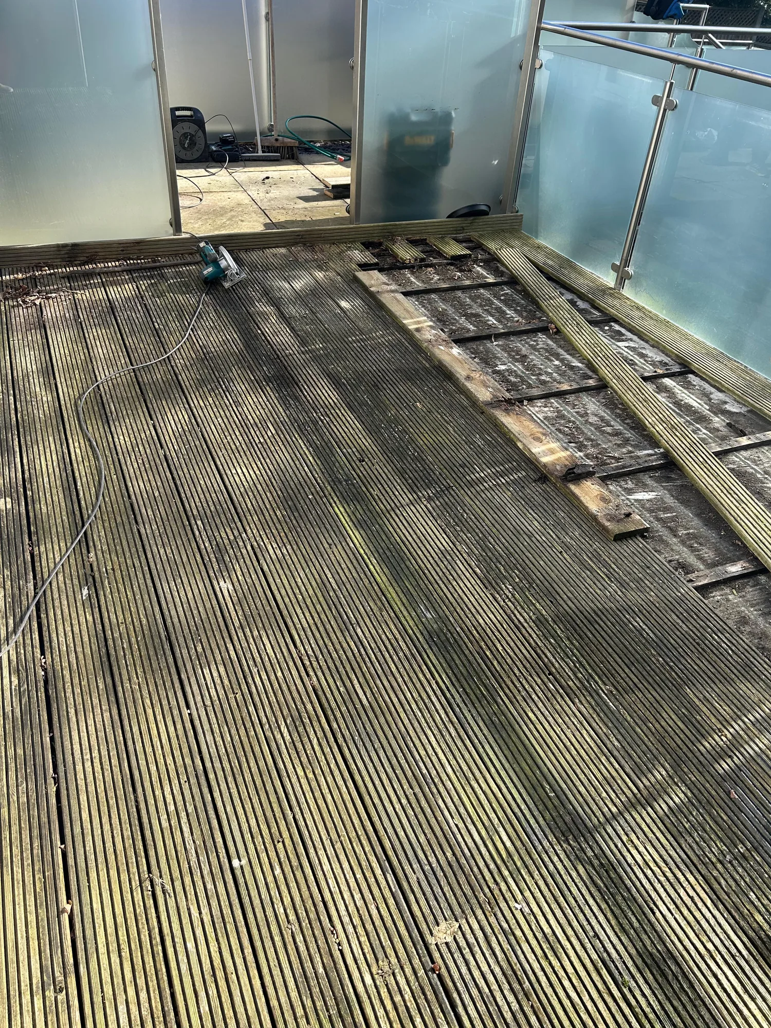 Rotted timber decking before composite replacement, Whetstone N20
