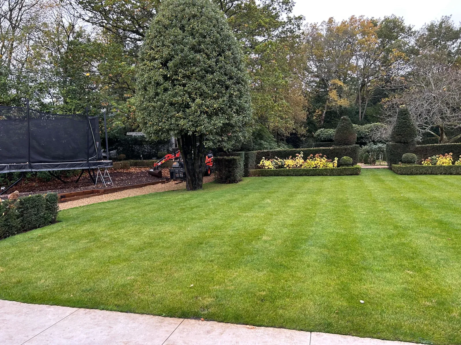 Routine garden maintenance work in progress