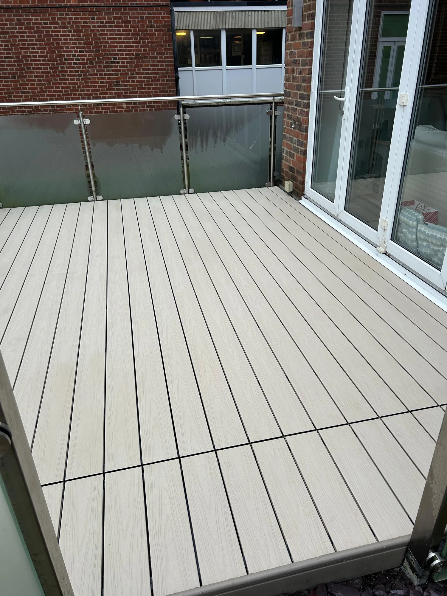 After: finished composite decking, alternative angle showing the full terrace